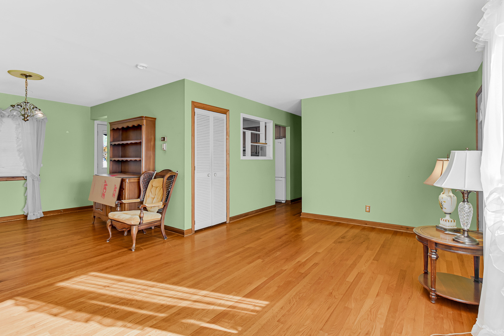 3346 Bernice Road Lansing, IL 60438 - Photo 9 of 24 a view of a room with furniture and wooden floor