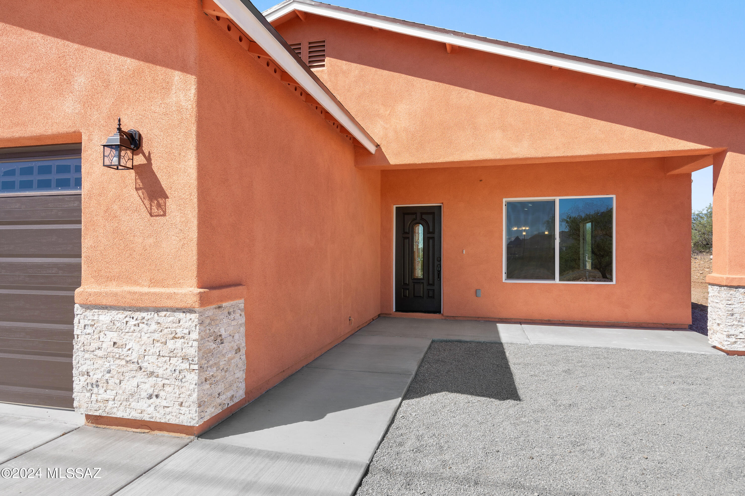 91 Avenida De Las Naciones Rio Rico, AZ 85648 - Photo 4 of 36 a front view of a house with windows