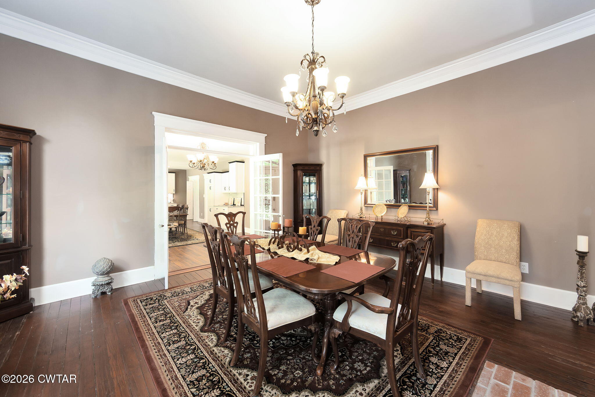 554 East Main Street Jackson, TN 38301 - Photo 11 of 60 a view of a dining room with furniture window and wooden floor