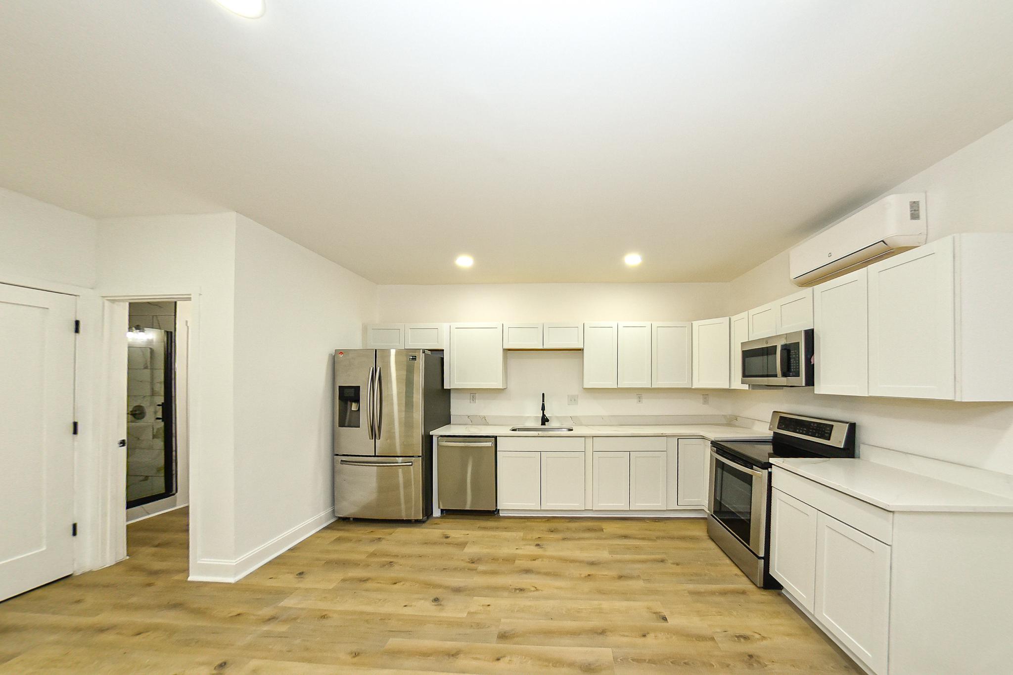 3704 Suitland Road Southeast Washington, DC 20020 - Photo 58 of 68 Modern in-law kitchen with sleek finishes.