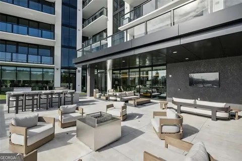 a view of the lobby with retail shops