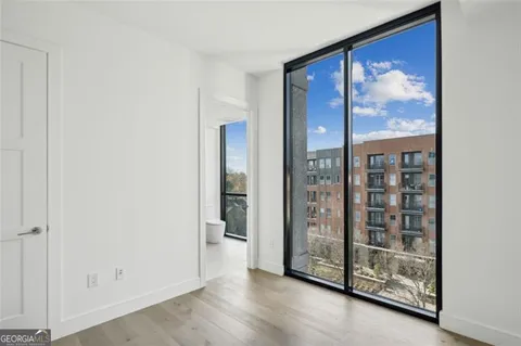 a view of an empty room and window