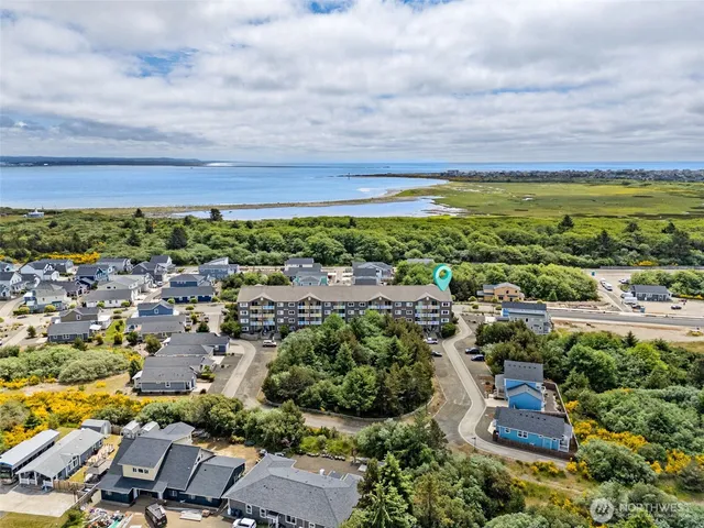 an aerial view of a house with a garden
