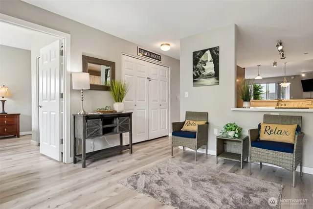 a view of a dining room with furniture window and wooden floor