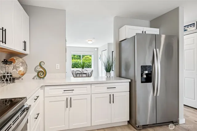 a view of a dining room with furniture