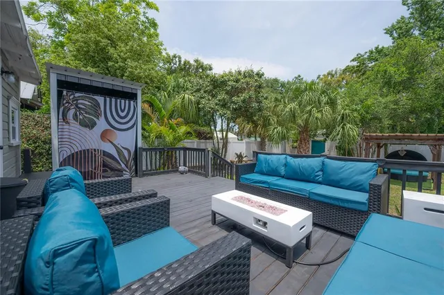 a view of a backyard with a barn and a tub