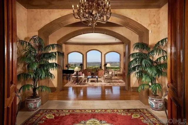 a view of a living room and dining room