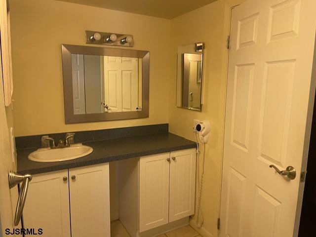 4500 West Brigantine Avenue, Unit 2322 Brigantine, NJ 08203 - Photo 11 of 16 a bathroom with a sink and a mirror