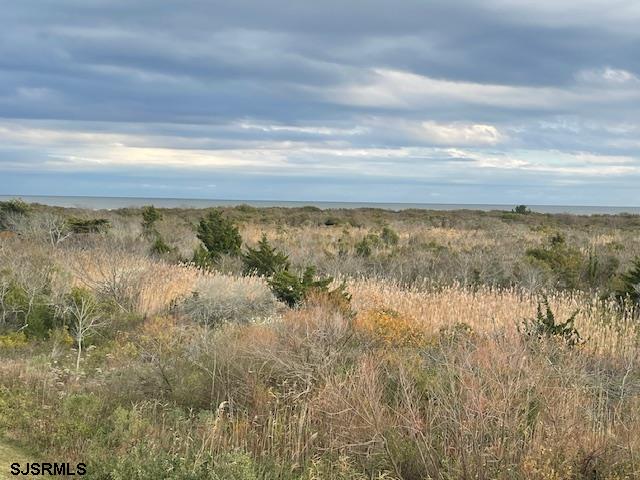 4500 West Brigantine Avenue, Unit 2322 Brigantine, NJ 08203 - Photo 14 of 16 a view of a lake from a yard
