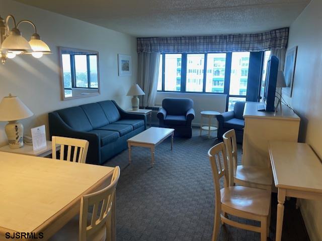 4500 West Brigantine Avenue, Unit 2322 Brigantine, NJ 08203 - Photo 4 of 16 a living room with furniture and a large window