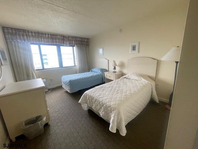 4500 West Brigantine Avenue, Unit 2322 Brigantine, NJ 08203 - Photo 9 of 16 a bed room with two bed and a couch