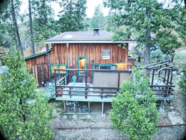 a view of a house with brick walls