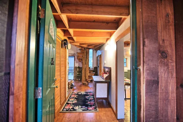 a view of living room and floor to ceiling window