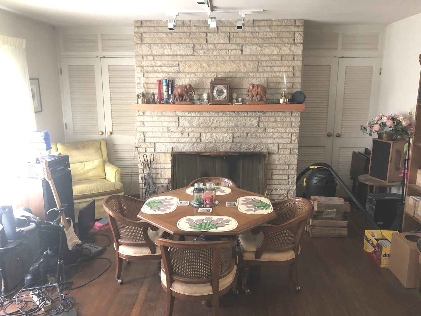 648 North Inverway Road Inverness, IL 60067 - Photo 4 of 11 a dining table with chairs and a fireplace