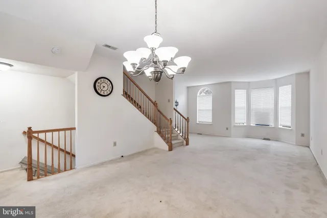 a view of an entryway with stairs