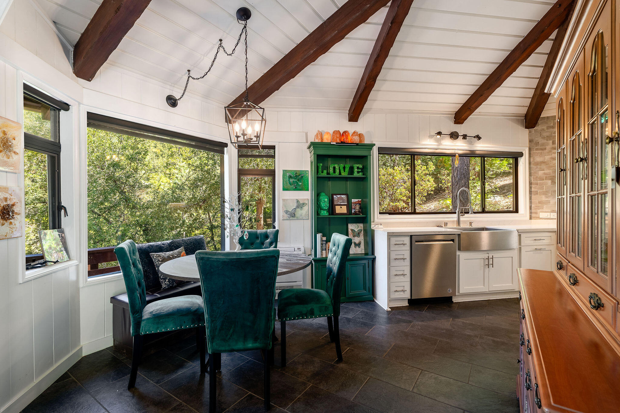 55599 Encino Road Idyllwild, CA 92549 - Photo 26 of 66 a view of a dining room with furniture window and outside view