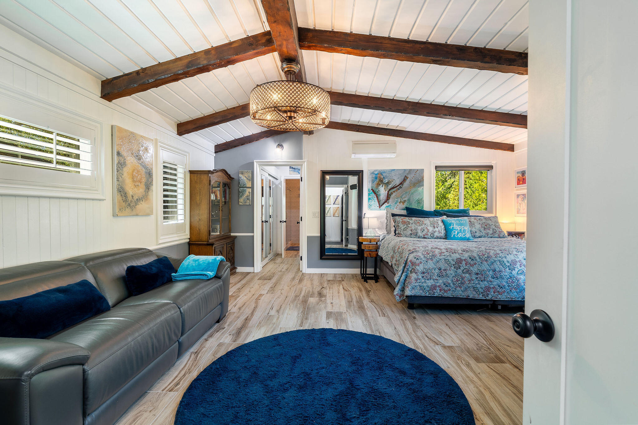 55599 Encino Road Idyllwild, CA 92549 - Photo 32 of 66 a living room with furniture and a chandelier