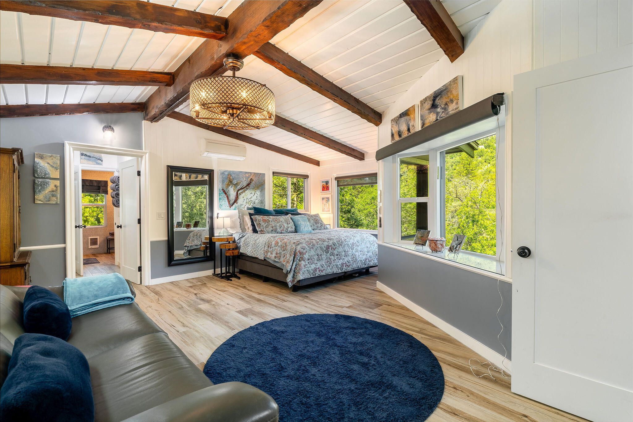 55599 Encino Road Idyllwild, CA 92549 - Photo 33 of 66 a living room with furniture and a large window