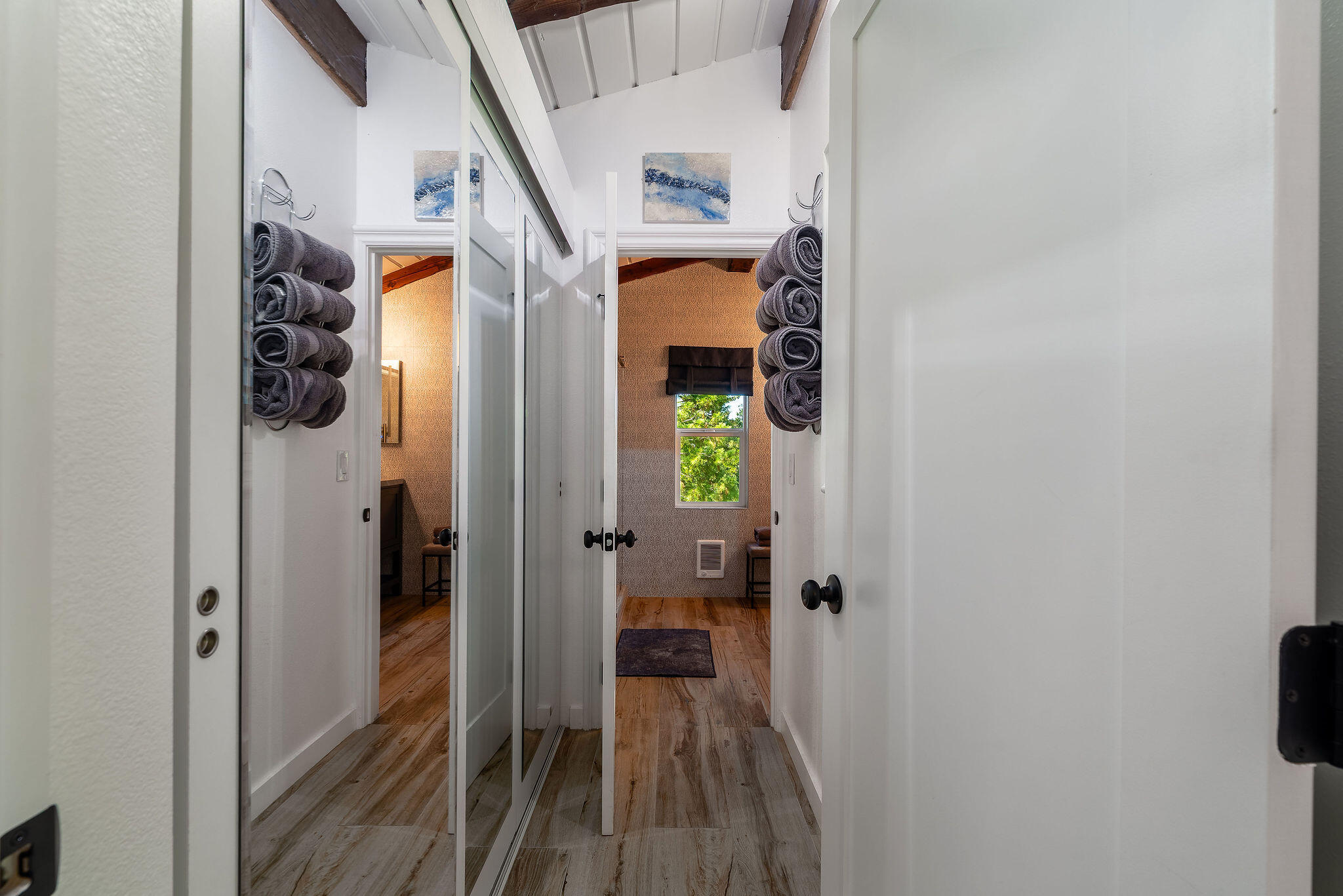 55599 Encino Road Idyllwild, CA 92549 - Photo 36 of 66 a view of a hallway with wooden floor and entryway