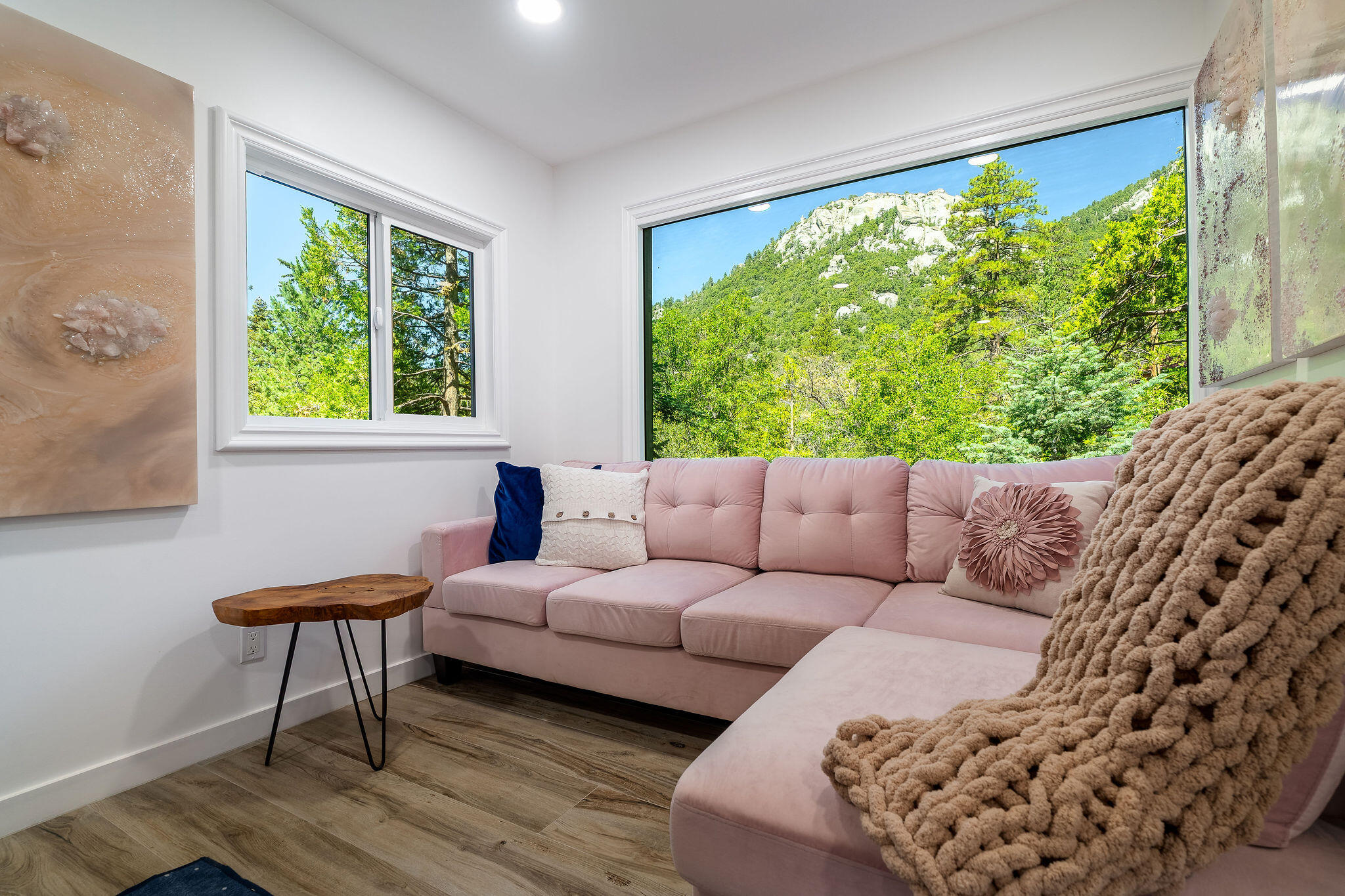 55599 Encino Road Idyllwild, CA 92549 - Photo 42 of 66 a living room with a couch and a large window
