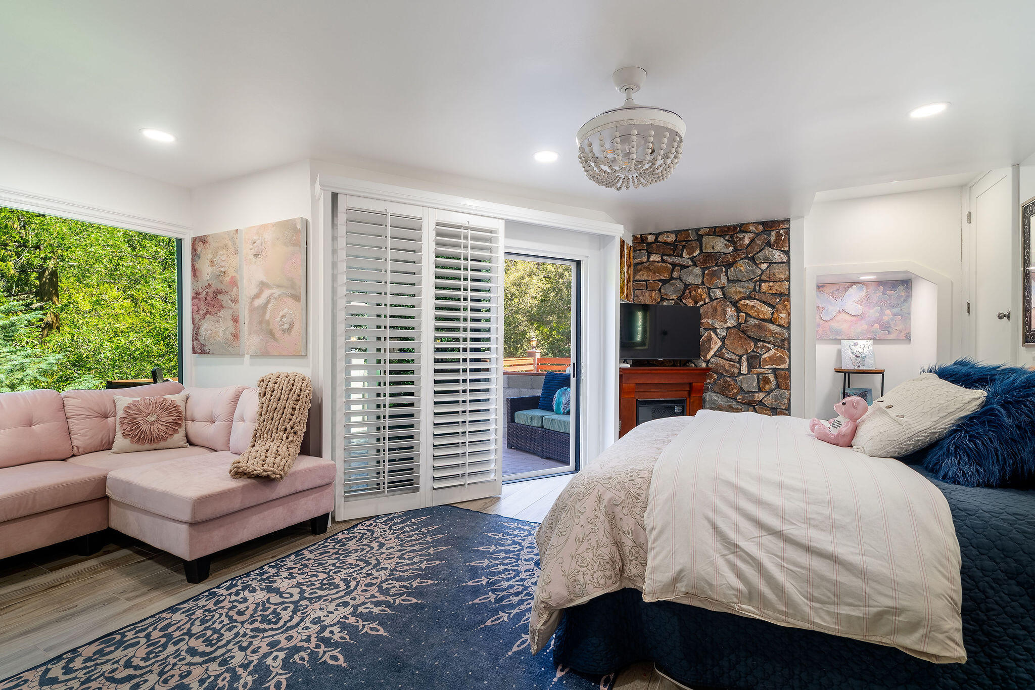 55599 Encino Road Idyllwild, CA 92549 - Photo 47 of 66 a bedroom with a bed and a couch