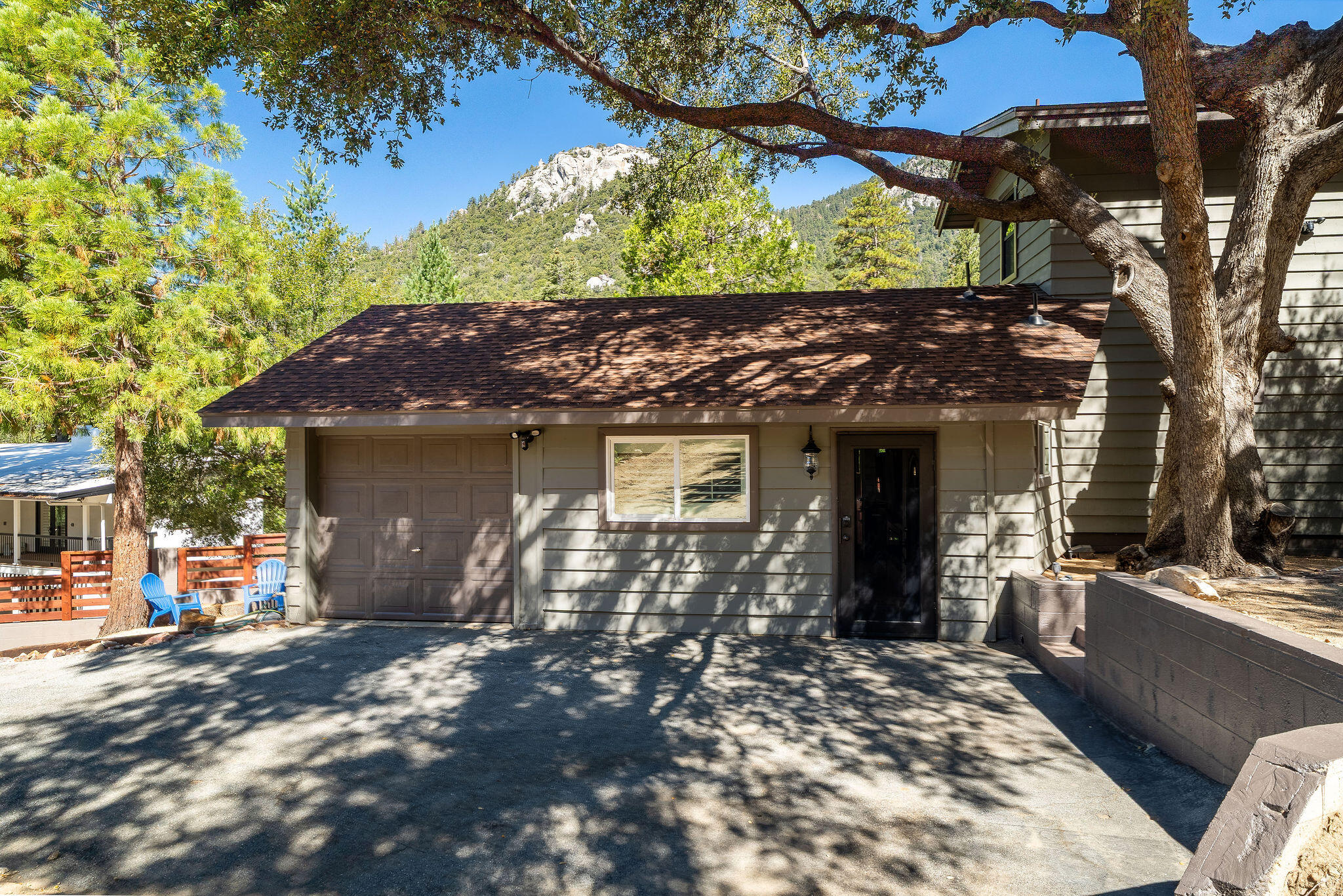 55599 Encino Road Idyllwild, CA 92549 - Photo 5 of 66 a view of a house with a patio
