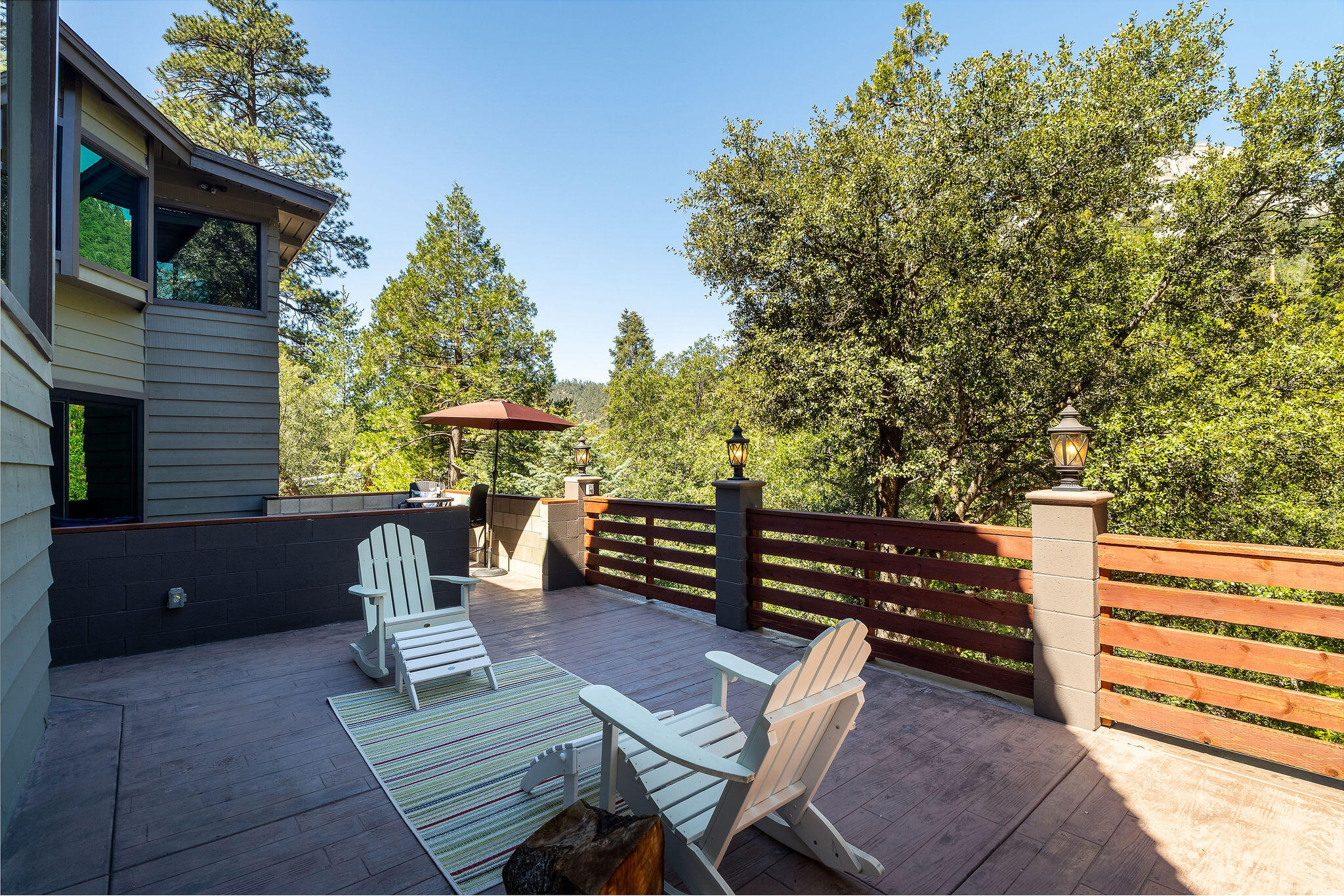 55599 Encino Road Idyllwild, CA 92549 - Photo 51 of 66 a view of a bench in a patio