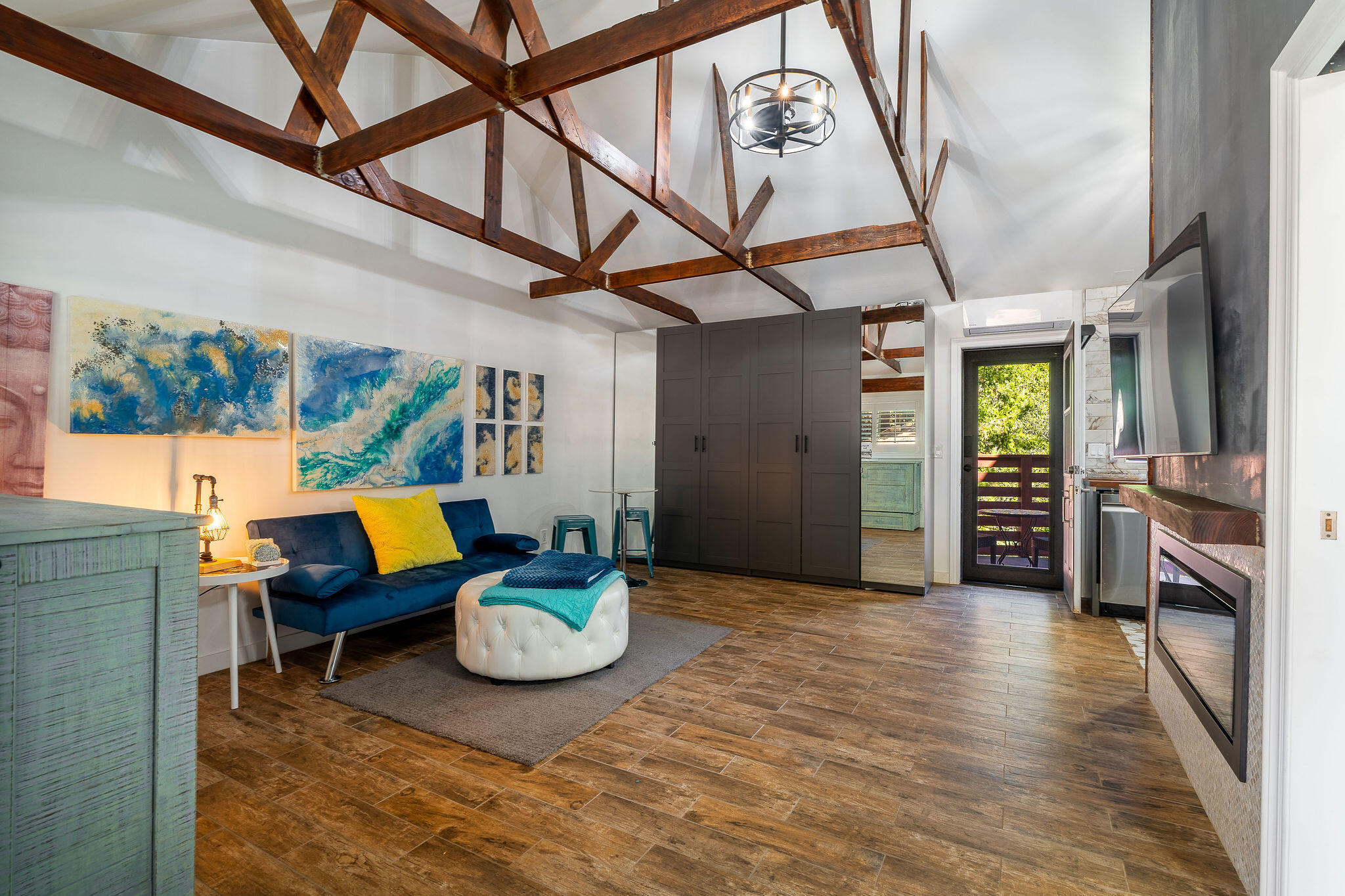 55599 Encino Road Idyllwild, CA 92549 - Photo 6 of 66 a living room with furniture and a wooden floor