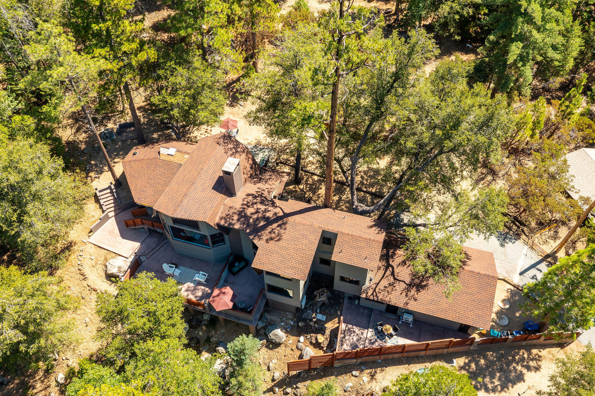 55599 Encino Road Idyllwild, CA 92549 - Photo 65 of 66 an aerial view of a house with a yard basket ball court and outdoor seating