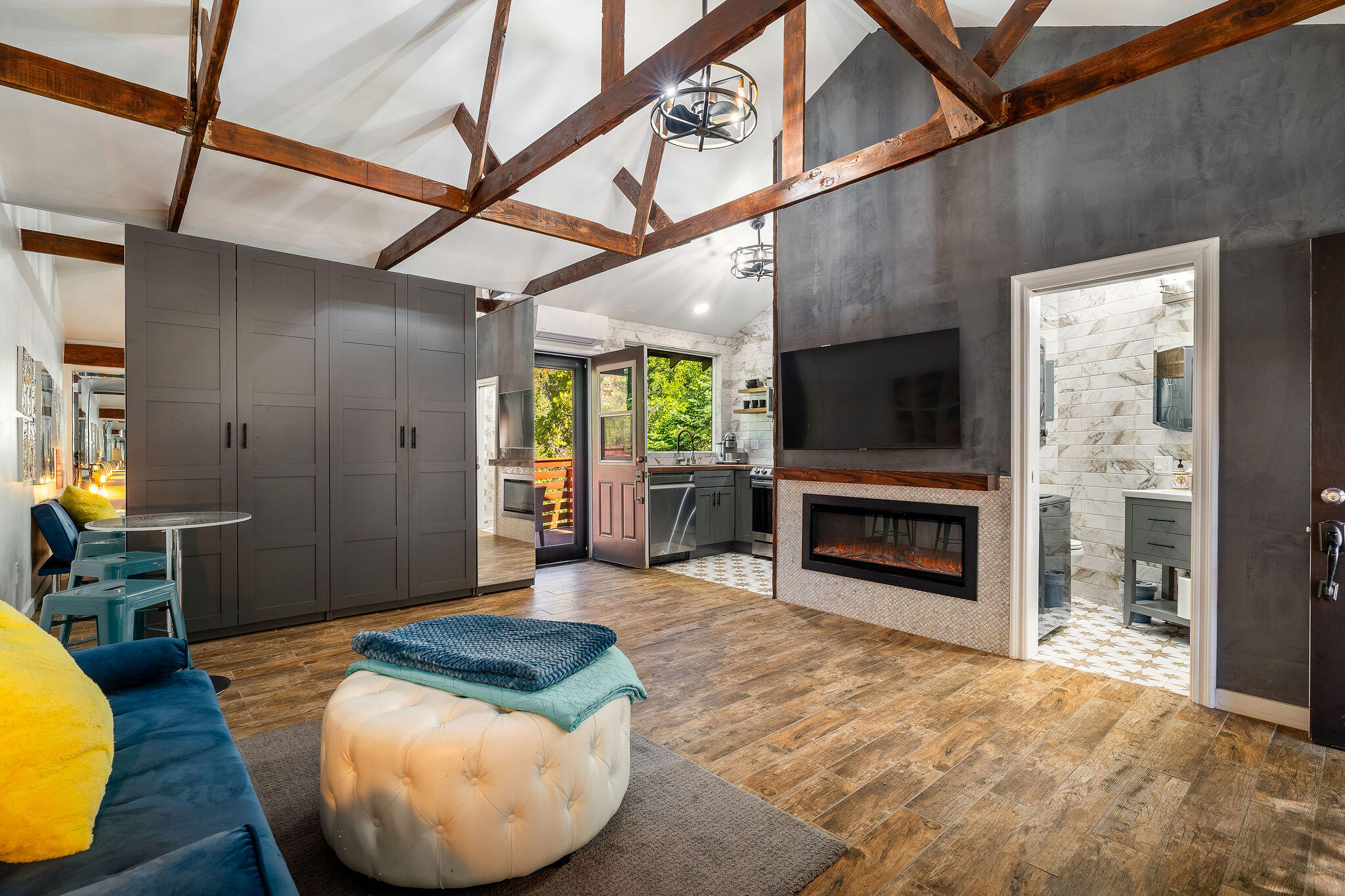 55599 Encino Road Idyllwild, CA 92549 - Photo 7 of 66 a living room with furniture and a flat screen tv