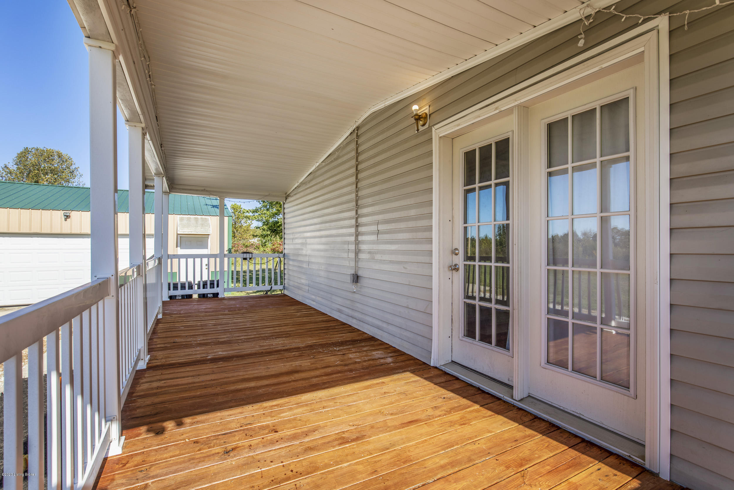 1203 Morrison Road Big Clifty, KY 42712 - Photo 24 of 33 Covered Deck area for your outdoor seating and table