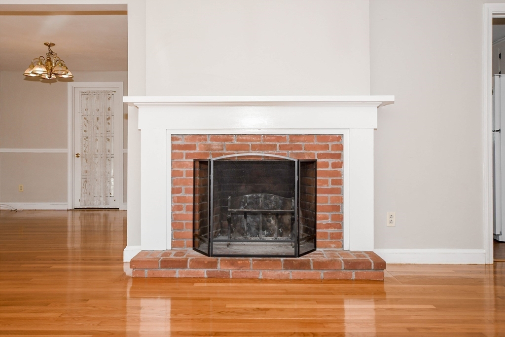 15 Zora Road Marion, MA 02738 - Photo 15 of 42 a white building with a fireplace