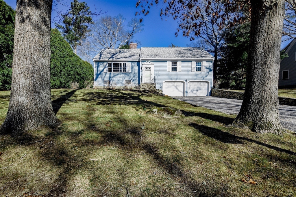 15 Zora Road Marion, MA 02738 - Photo 3 of 42 a view of a house with a small yard plants and large tree