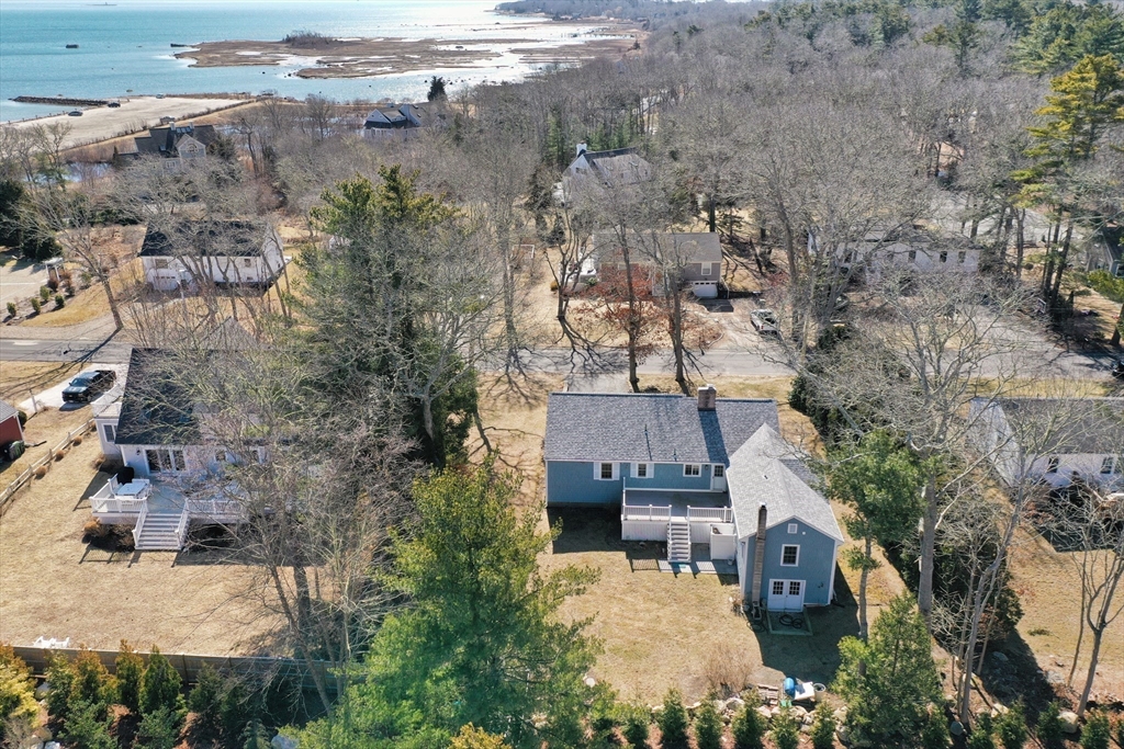 15 Zora Road Marion, MA 02738 - Photo 38 of 42 an aerial view of a house with a yard