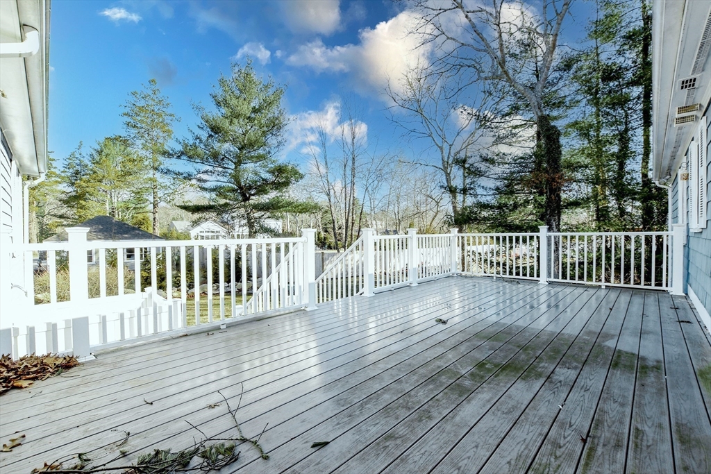 15 Zora Road Marion, MA 02738 - Photo 8 of 42 a view of a house with wooden deck