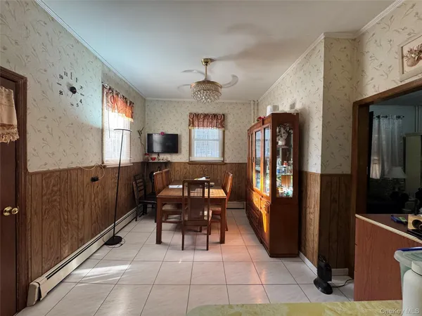 a view of a livingroom with furniture and window