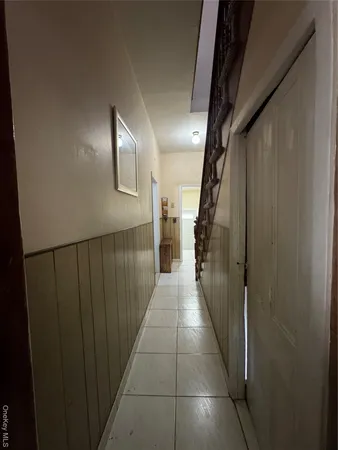 a bedroom with a bed and dresser