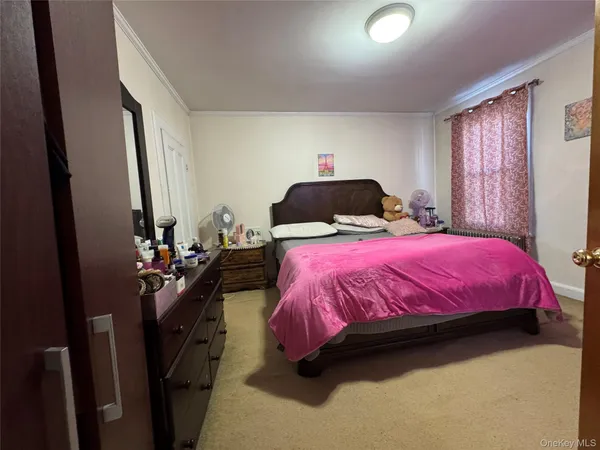 a bed room with a bed and a couch