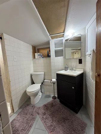 a kitchen with a sink and a stove top oven