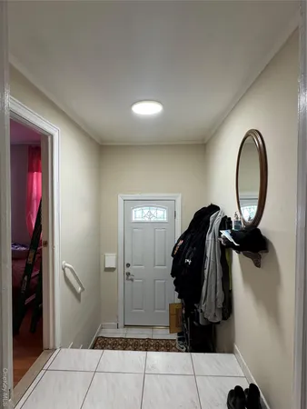 a bed room with a bed and a window