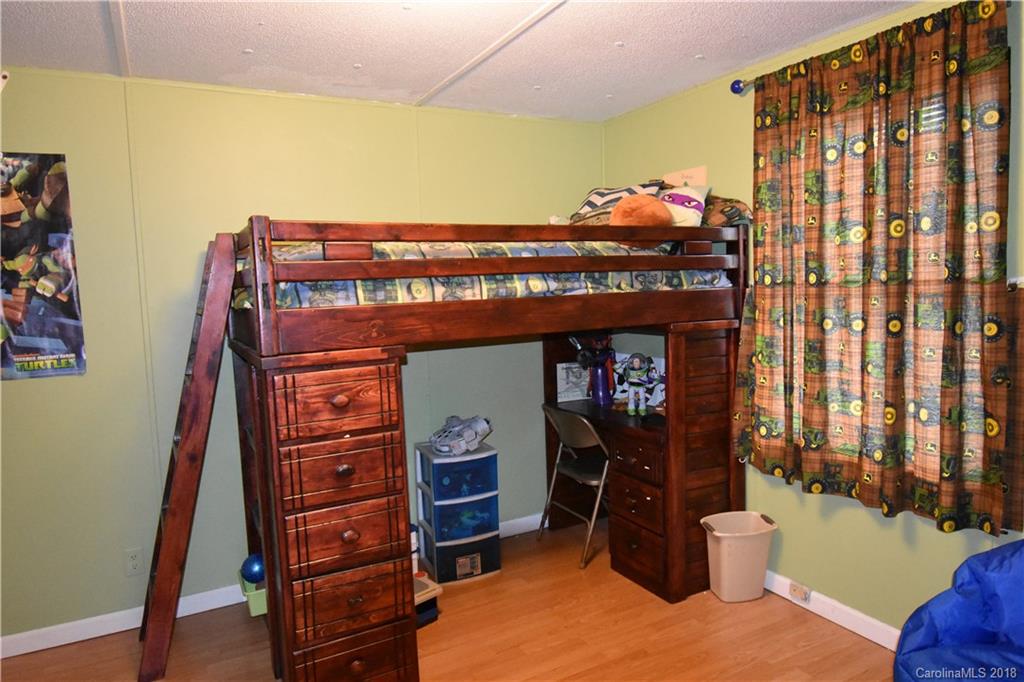 463 Lindsey Loop Road Fletcher, NC 28732 - Photo 22 of 27 a view of room with furniture and a closet