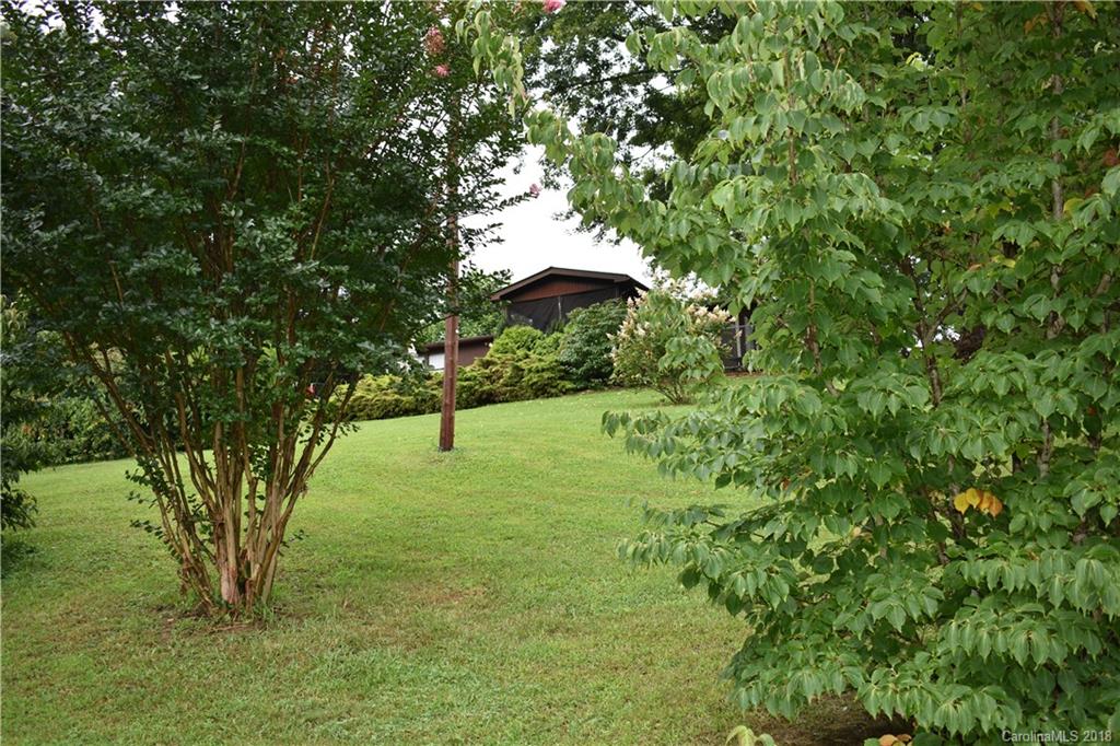 463 Lindsey Loop Road Fletcher, NC 28732 - Photo 27 of 27 a view of a yard with a tree