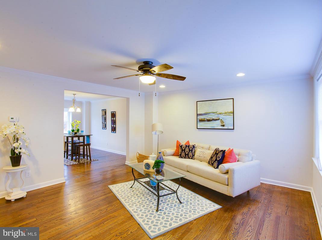 1927 Northbourne Road Baltimore, MD 21239 - Photo 14 of 30 a living room with furniture and wooden floor