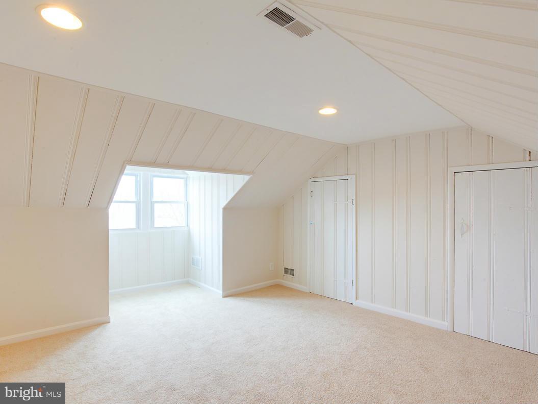 1927 Northbourne Road Baltimore, MD 21239 - Photo 22 of 30 an empty room with windows