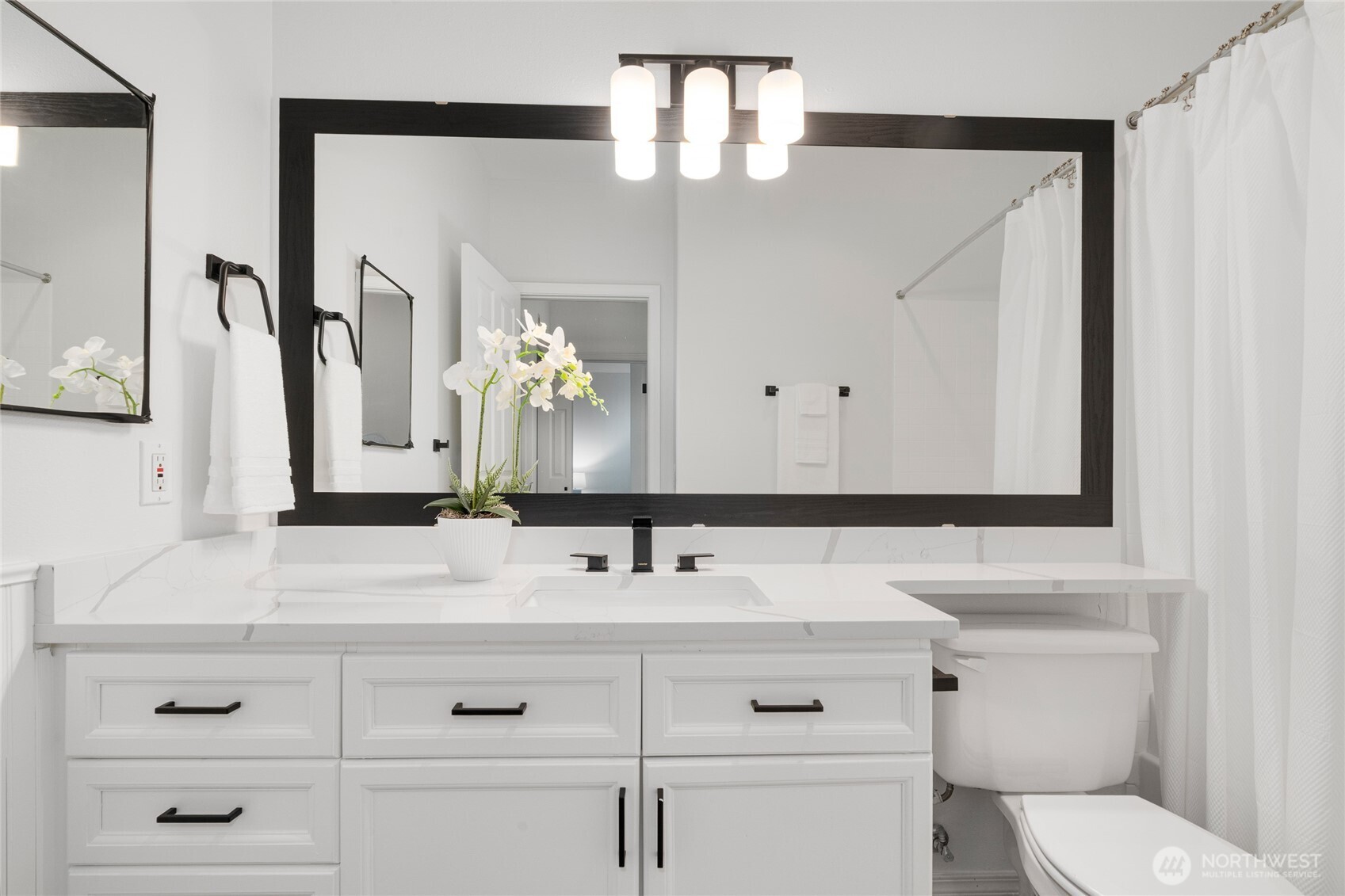 7583 Old Redmond Road, Unit A203 Redmond, WA 98052 - Photo 14 of 29 a bathroom with a sink vanity and a mirror