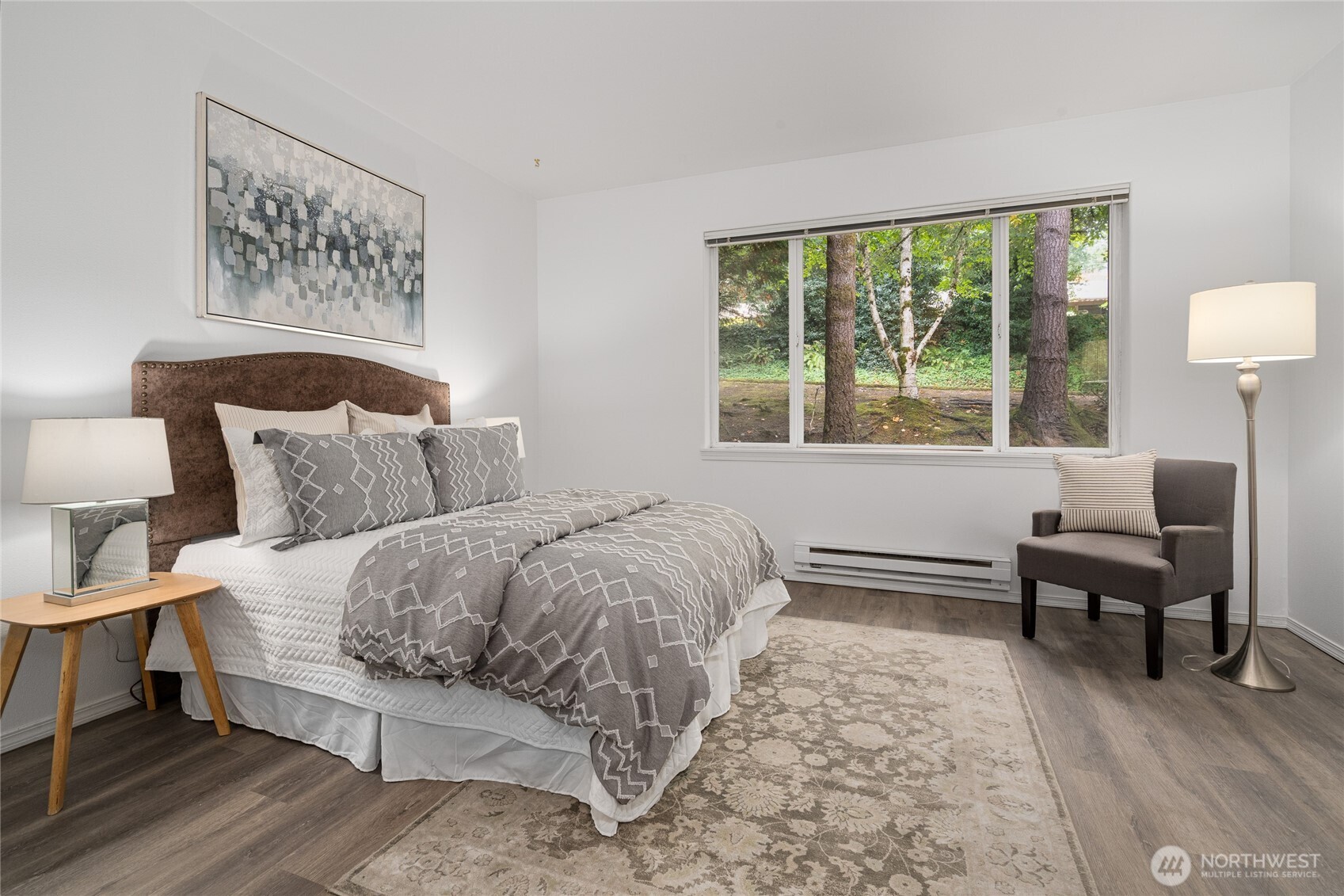 7583 Old Redmond Road, Unit A203 Redmond, WA 98052 - Photo 18 of 29 a spacious bedroom with a bed and a large window