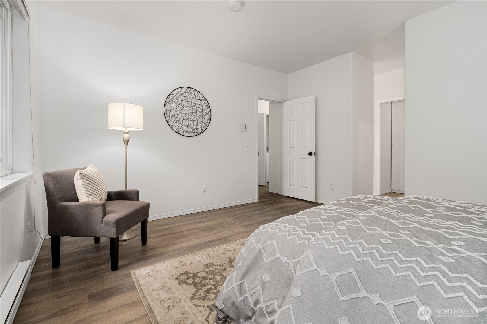 7583 Old Redmond Road, Unit A203 Redmond, WA 98052 - Photo 19 of 29 a bedroom with a bed and a table