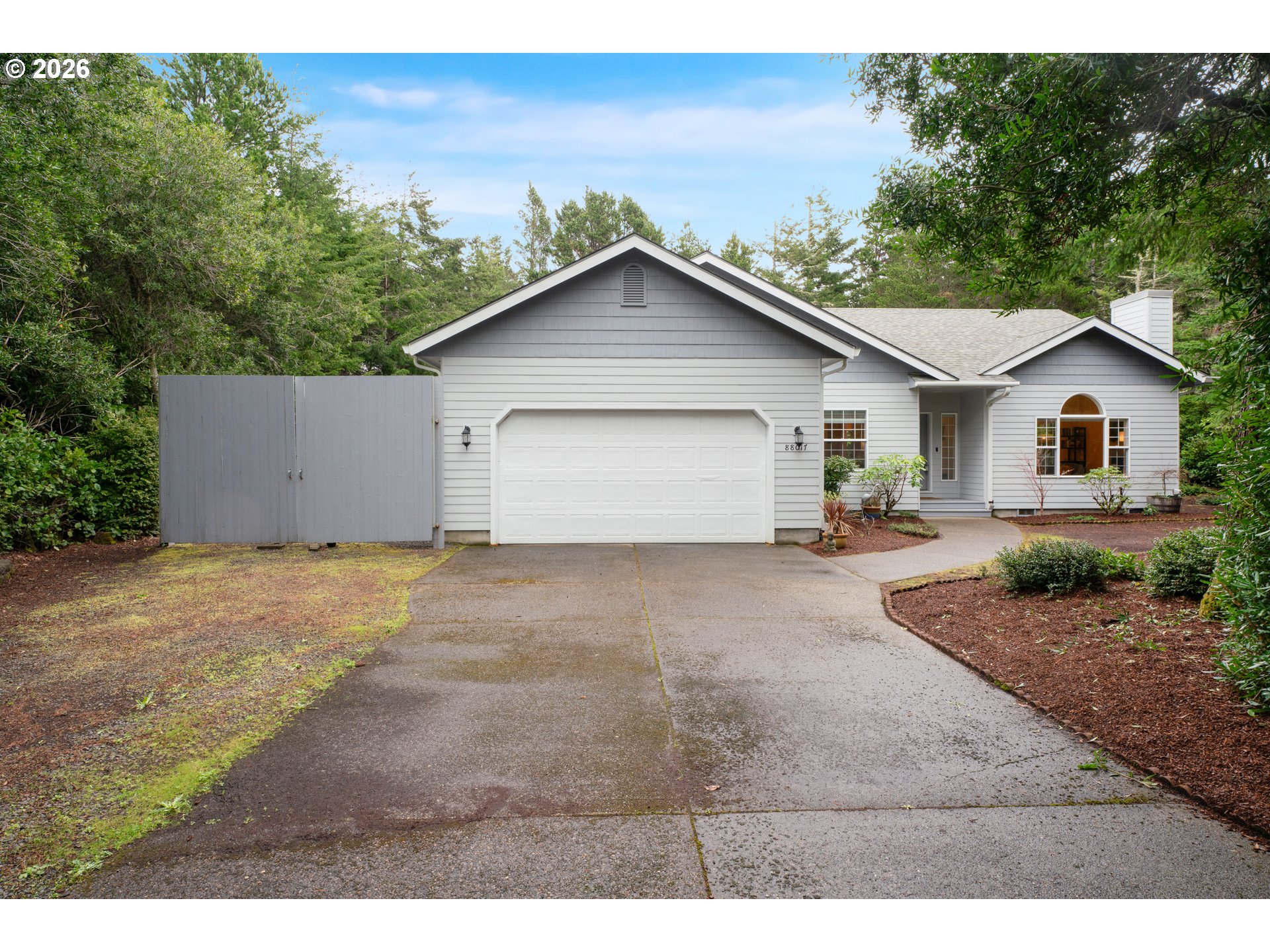 88017 South Wind Jammer Street Florence, OR 97439 - Photo 2 of 48 a view of outdoor space yard and garage