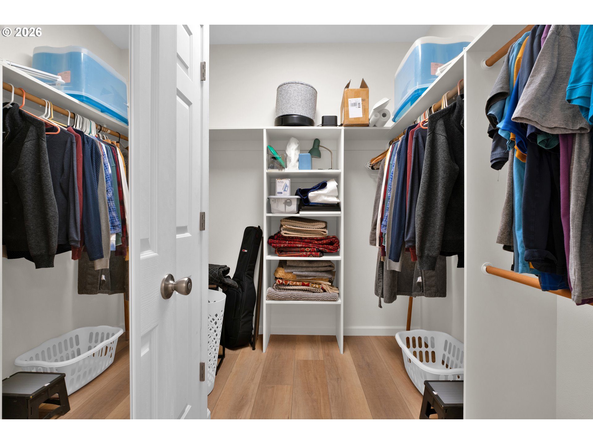 88017 South Wind Jammer Street Florence, OR 97439 - Photo 32 of 48 a view of walk in closet with clothes and shoes