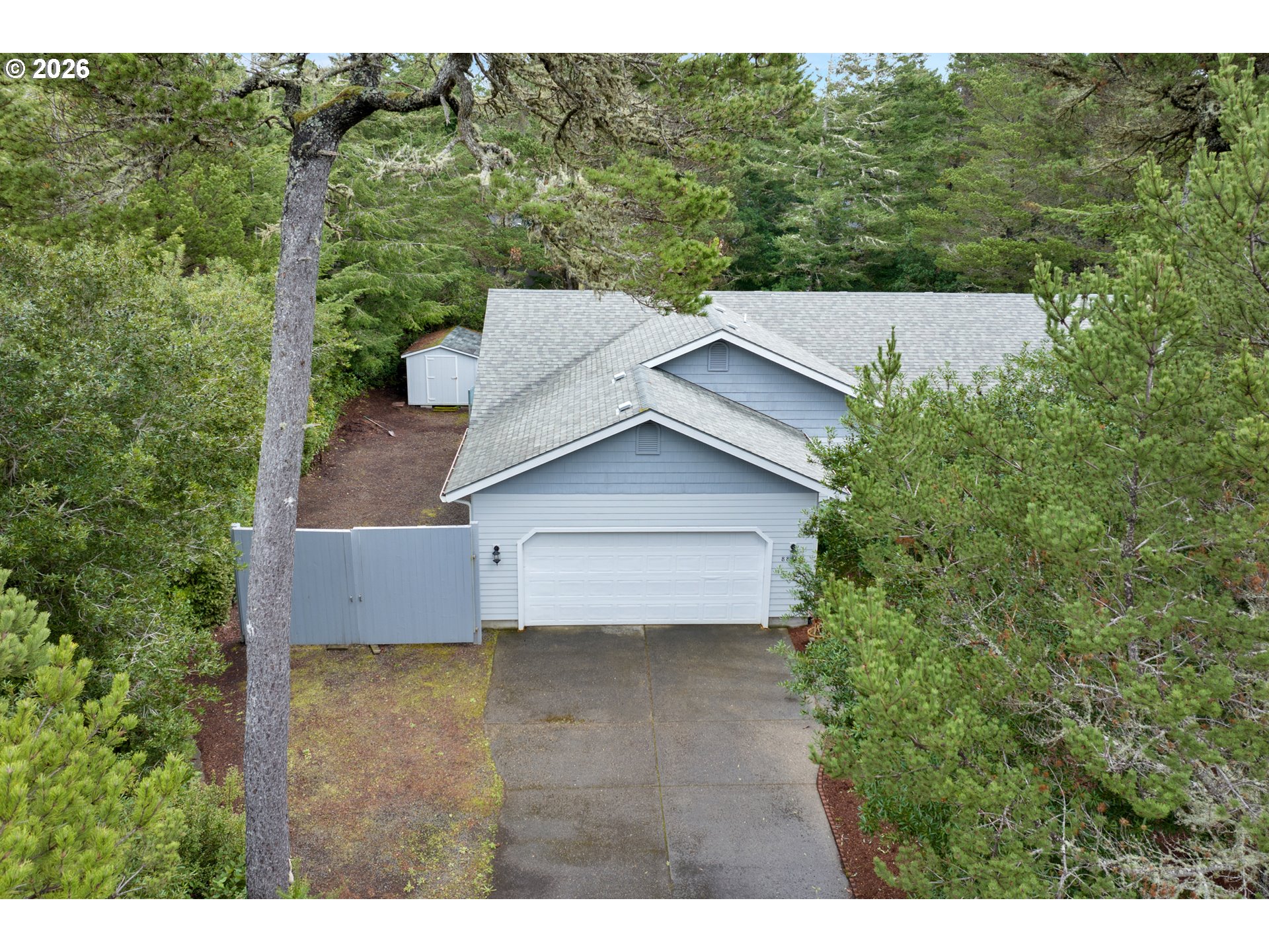 88017 South Wind Jammer Street Florence, OR 97439 - Photo 46 of 48 a view of a house with a yard